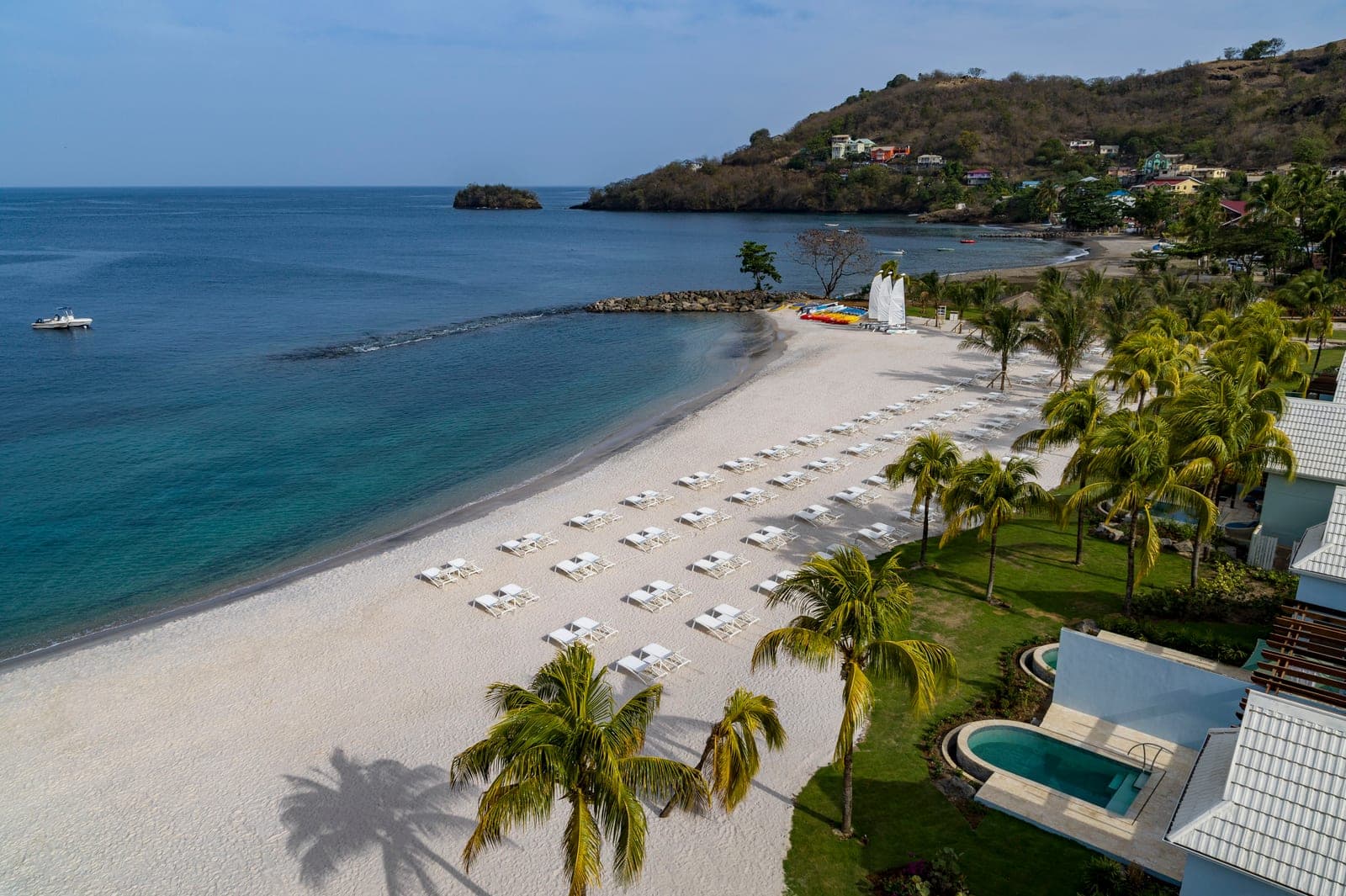 Aerial drone view of the beach and pool at Sandals Saint Vincent