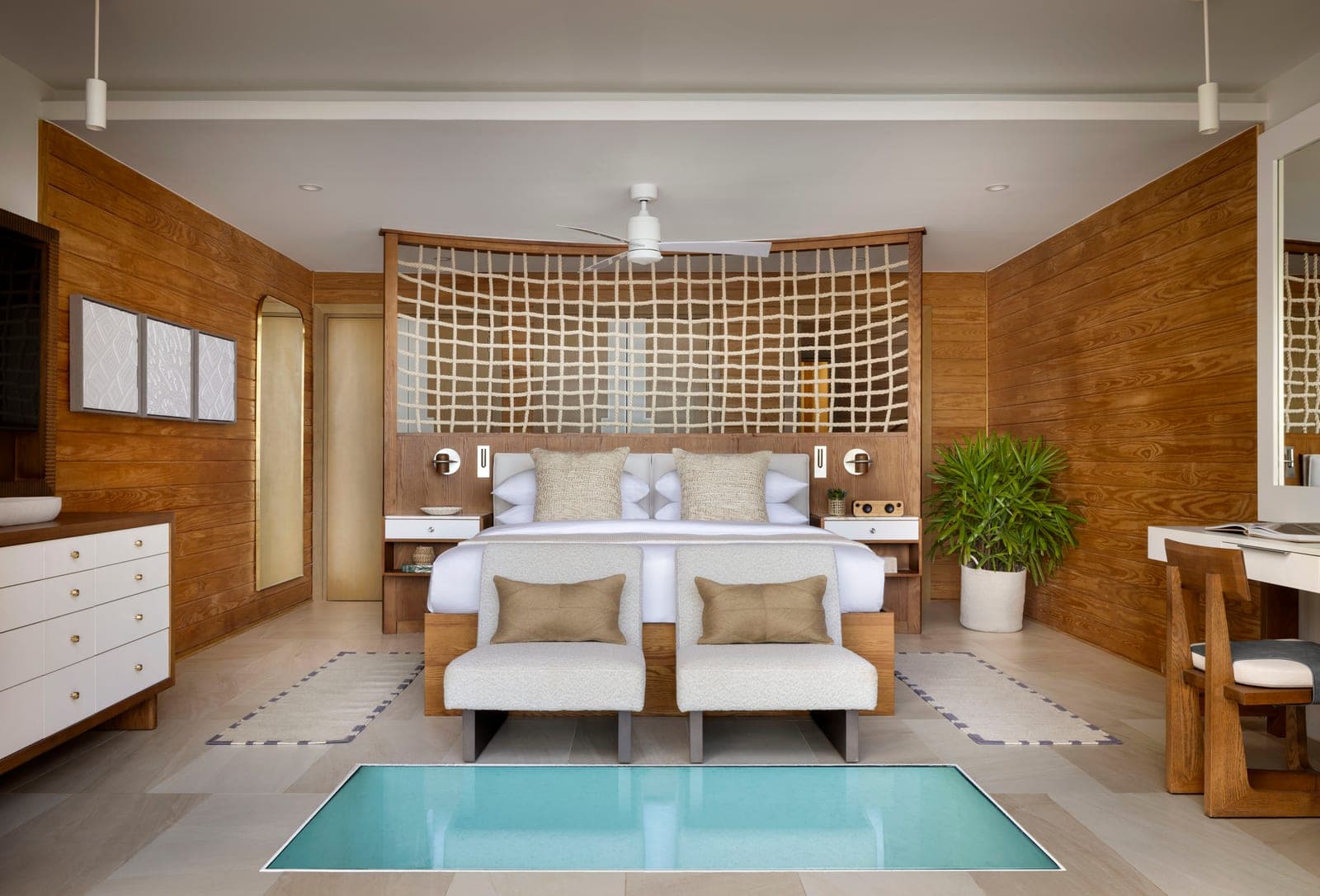 Vincy Overwater Two Story Villa bedroom at Sandals Saint Vincent, set within the resort's private cove