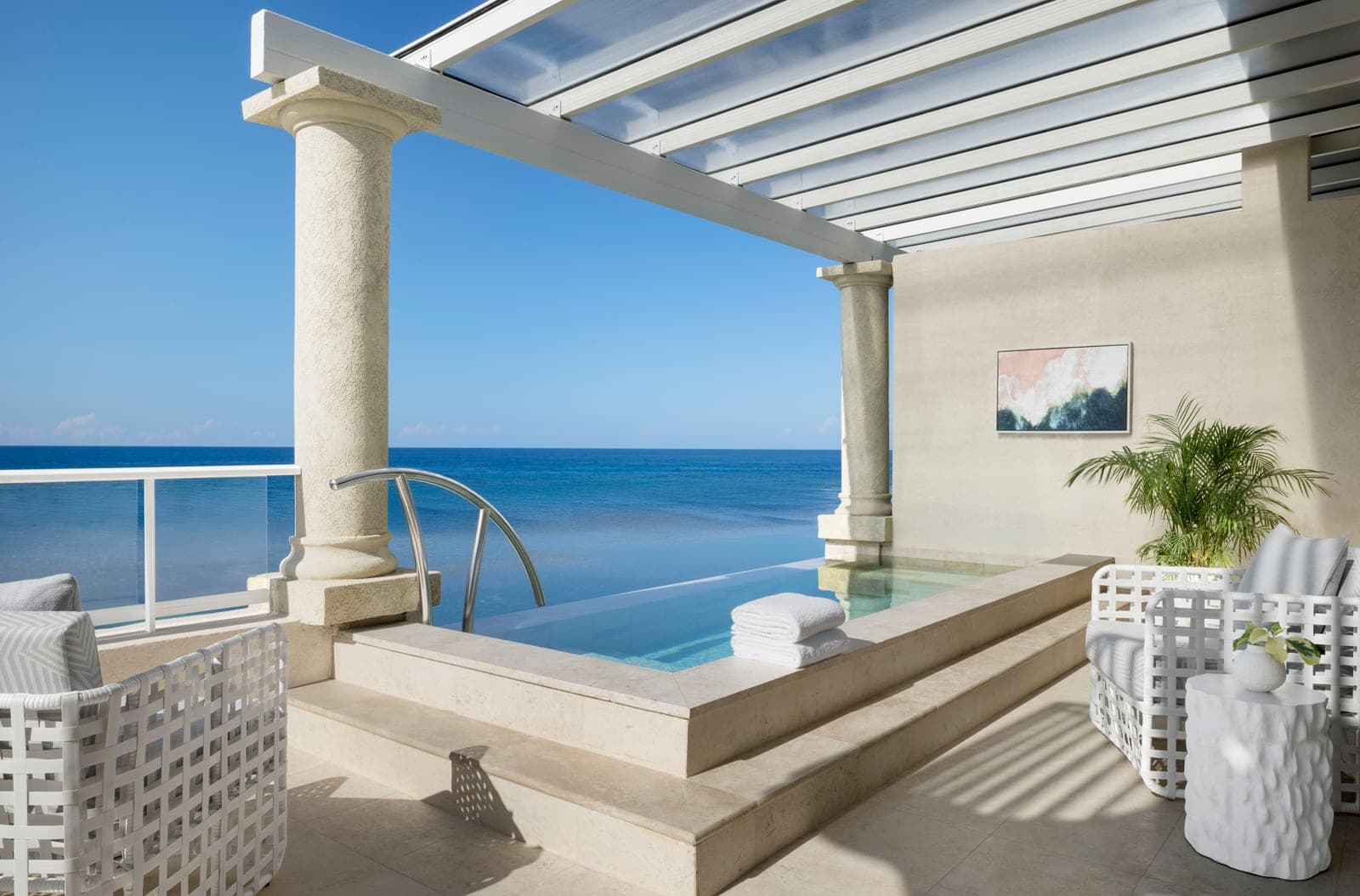 A private plunge pool on an oceanfront balcony at Sandals Caribbean Cay