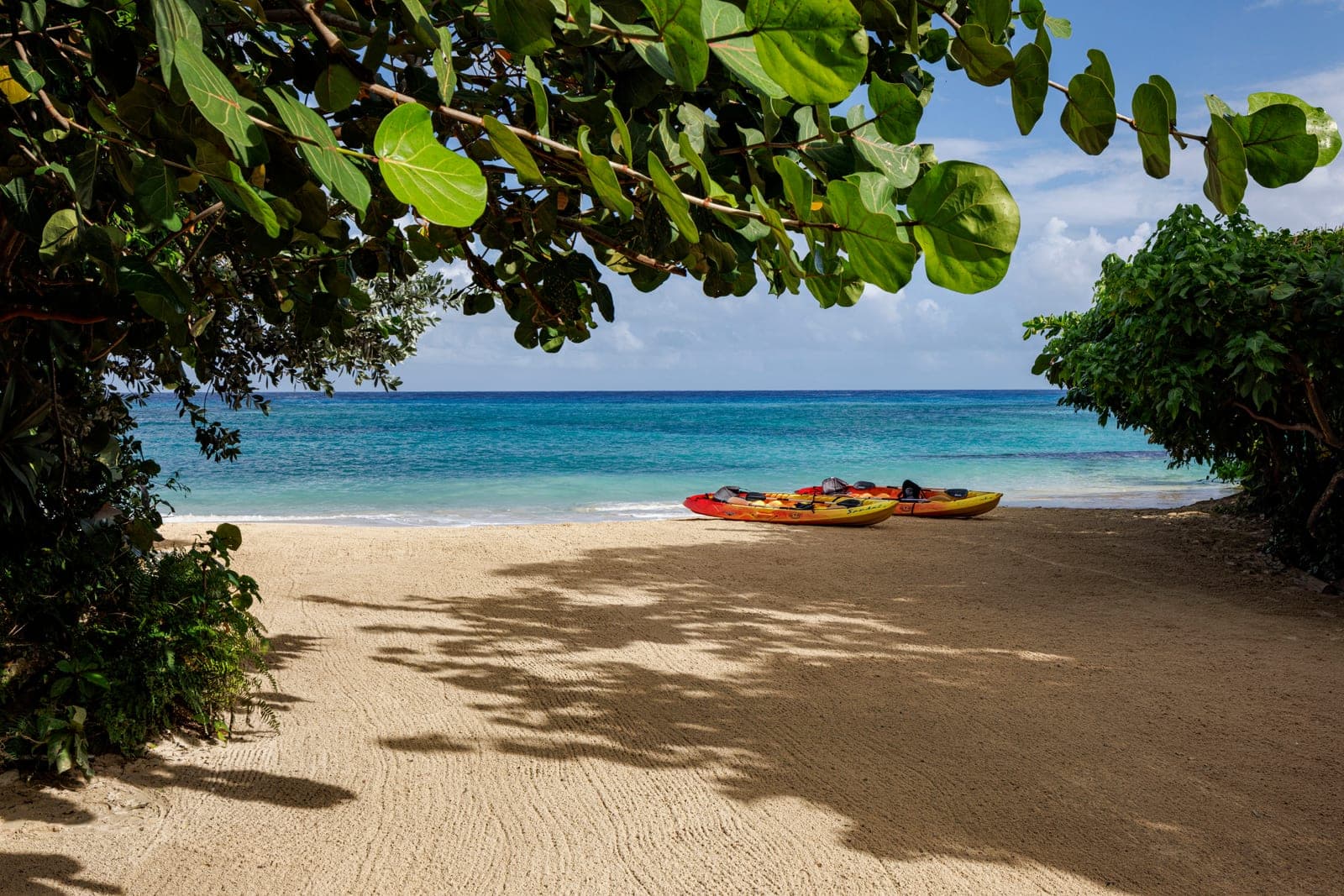 Paddleboards on the beach at Sandals Ochi
