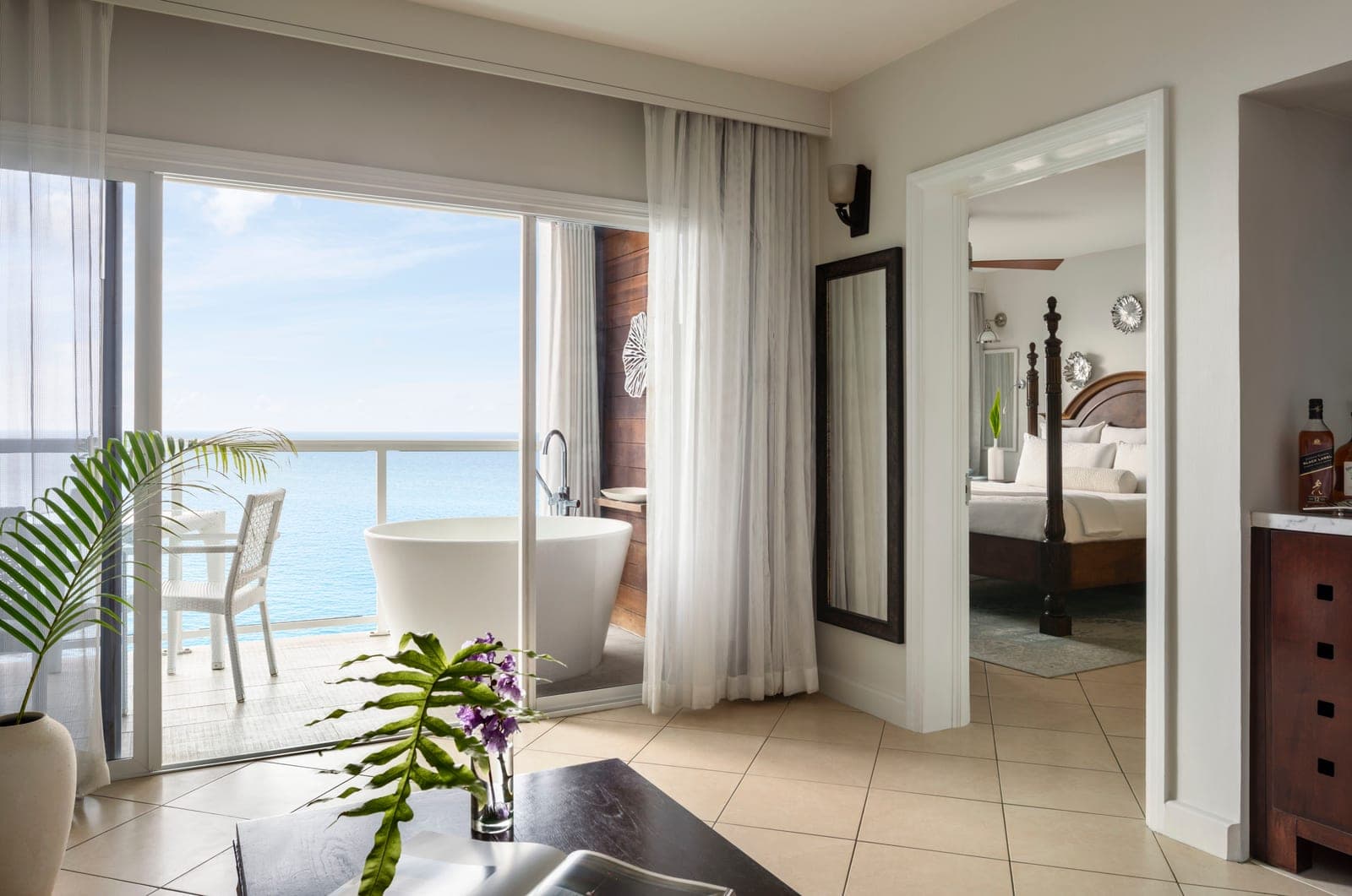 Sunset Bluff Oceanview One Bedroom Butler Suite with Balcony Tranquility Soaking Tub at Sandals Regency La Toc