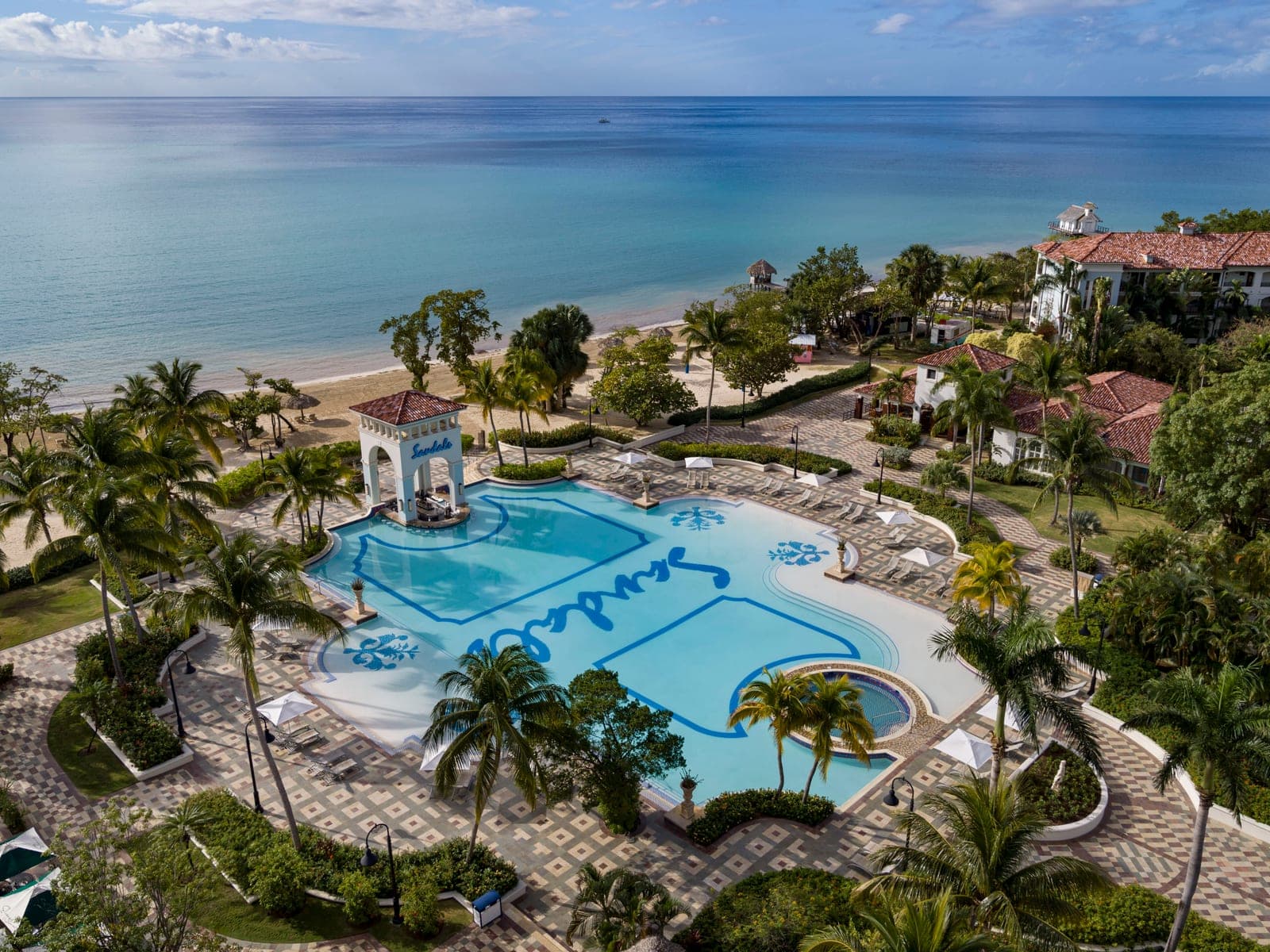 Main pool and ocean view at Sandals South Coast